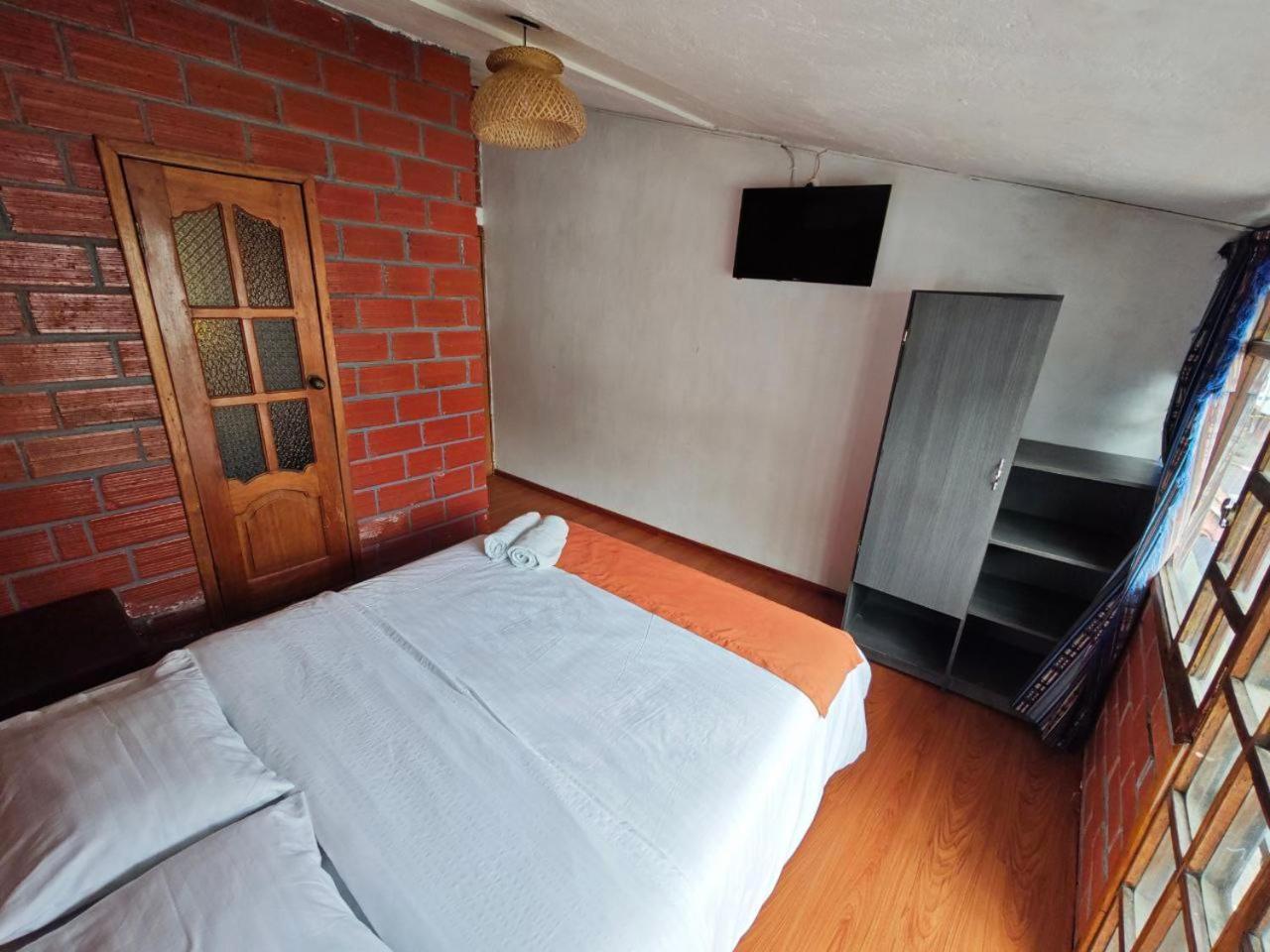 Garden House Hostal Баньйос Екстер'єр фото